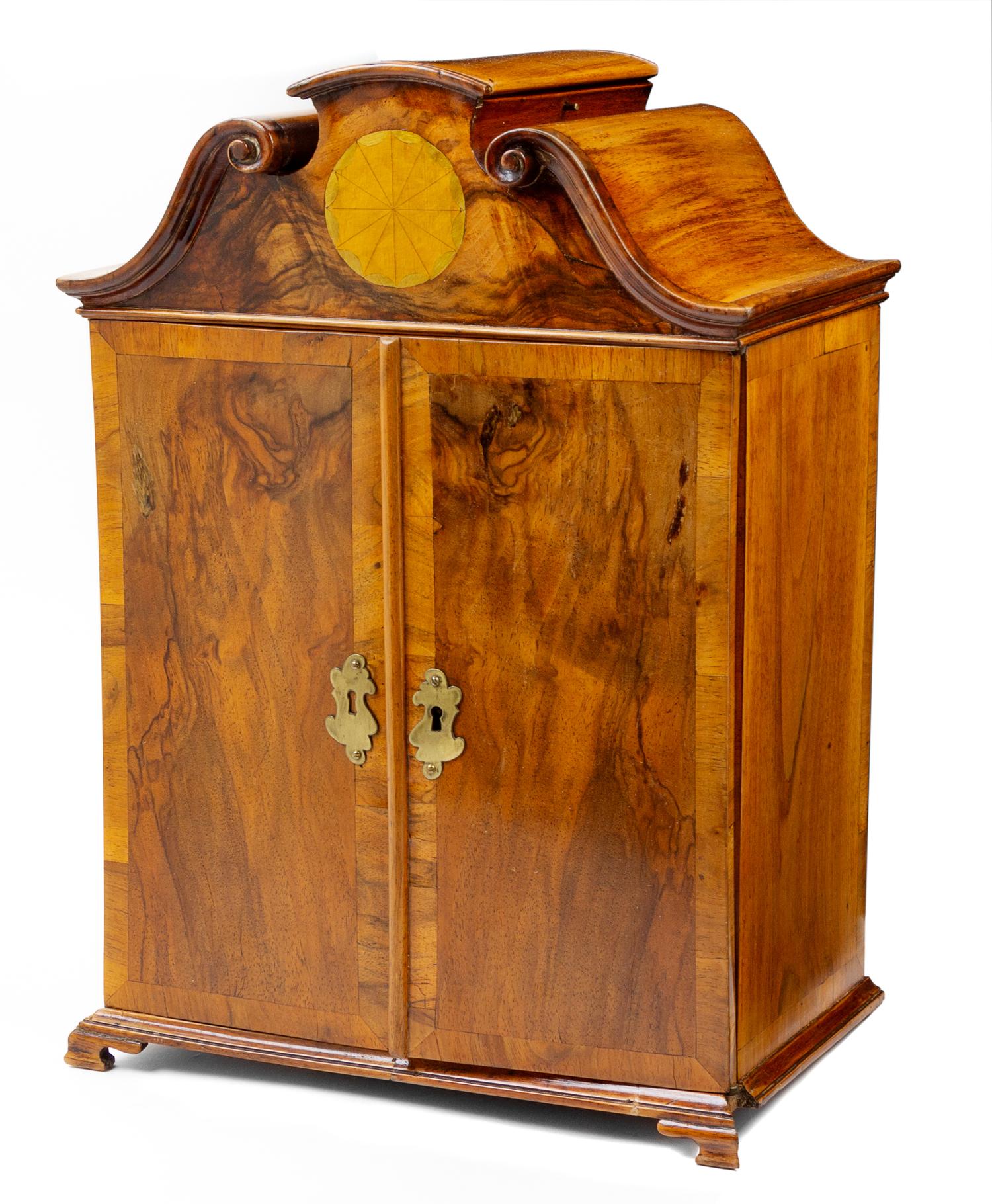 A Diminutive Continental Walnut Cabinet Height 16 1/2 inches. — 19TH CENTURY