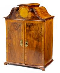 A Diminutive Continental Walnut Cabinet Height 16 1/2 inches. — 19TH CENTURY