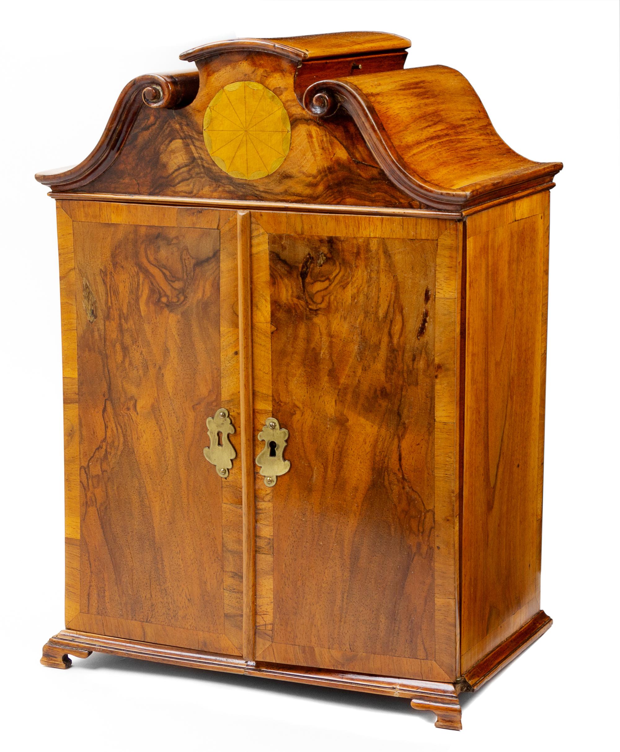 A Diminutive Continental Walnut Cabinet Height 16 1/2 inches. — 19TH CENTURY