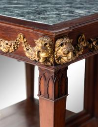 A Pair of Portuguese Gilt Bronze Mounted and Marble-Inset Mahogany Pier Tables