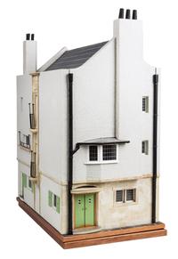 A Scottish Art Nouveau Style House Height 26 x width 12 1/4 x depth 19 inches.