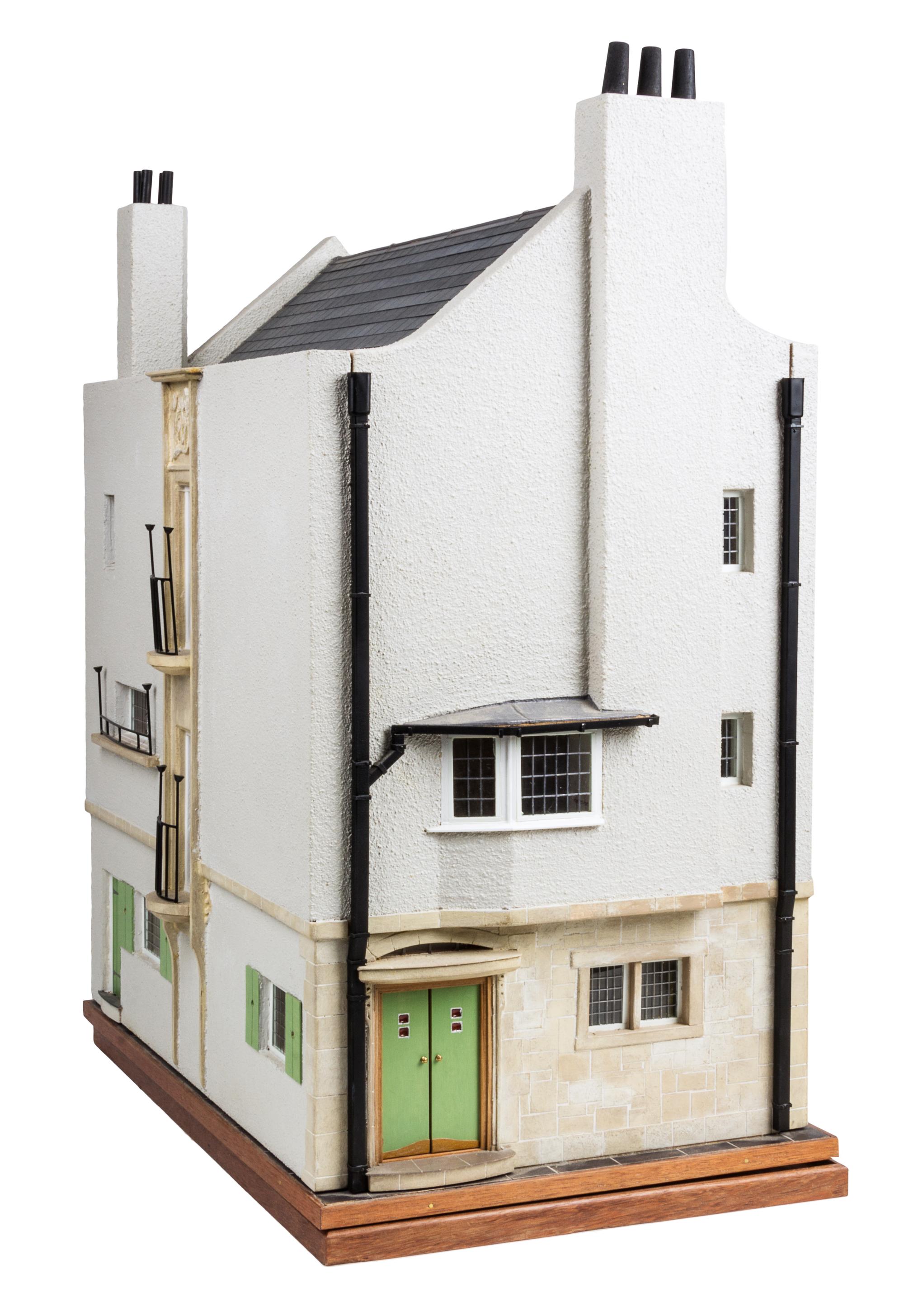 A Scottish Art Nouveau Style House Height 26 x width 12 1/4 x depth 19 inches.