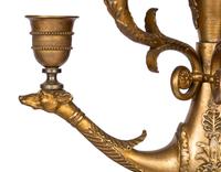 A Pair of Empire Style Gilt and Patinated Bronze Six-Light Figural Candelabra
