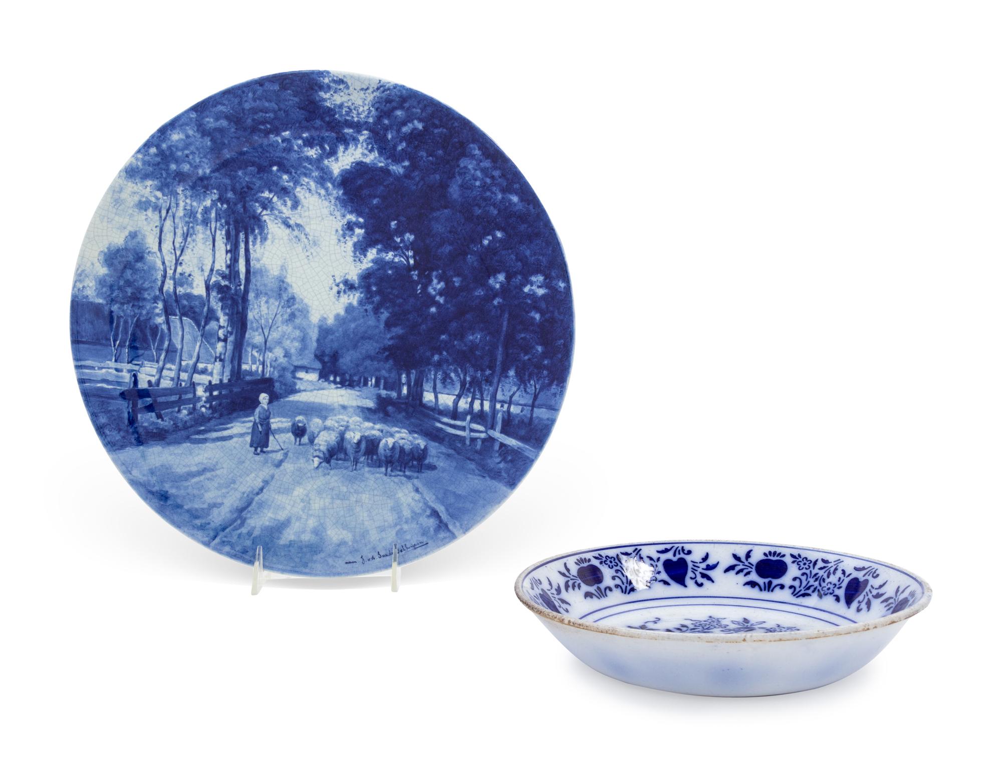 Two Continental Blue and White Glazed Earthenware Plates