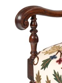 A Pair of William and Mary Style Walnut Armchairs with Crewelwork Upholstery
