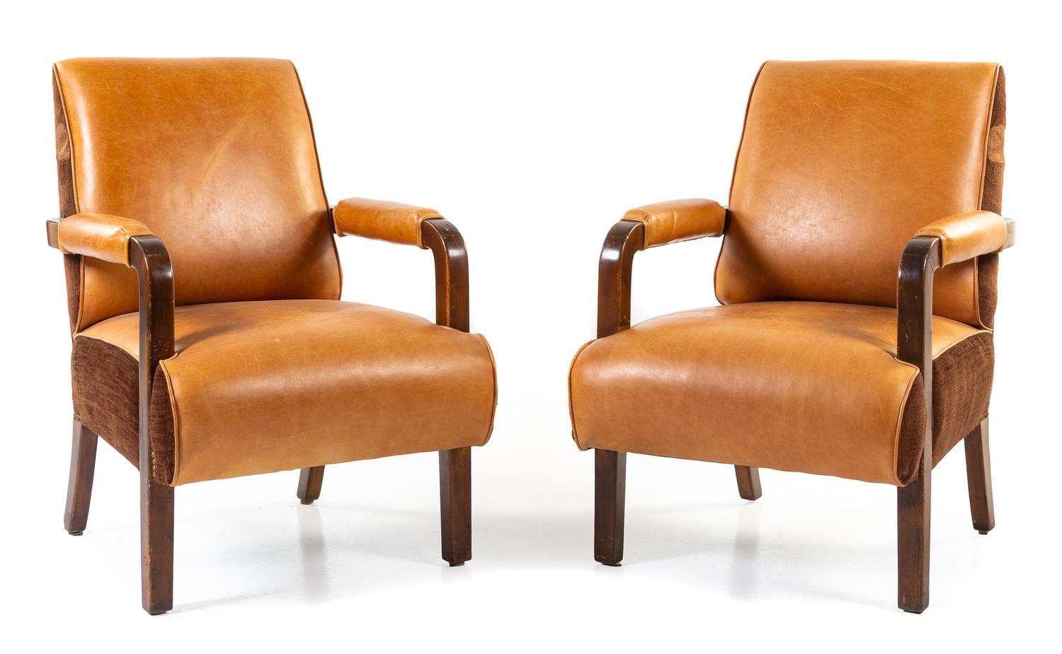 A Pair of Upholstered Pullman Car Armchairs