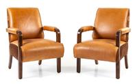 A Pair of Upholstered Pullman Car Armchairs