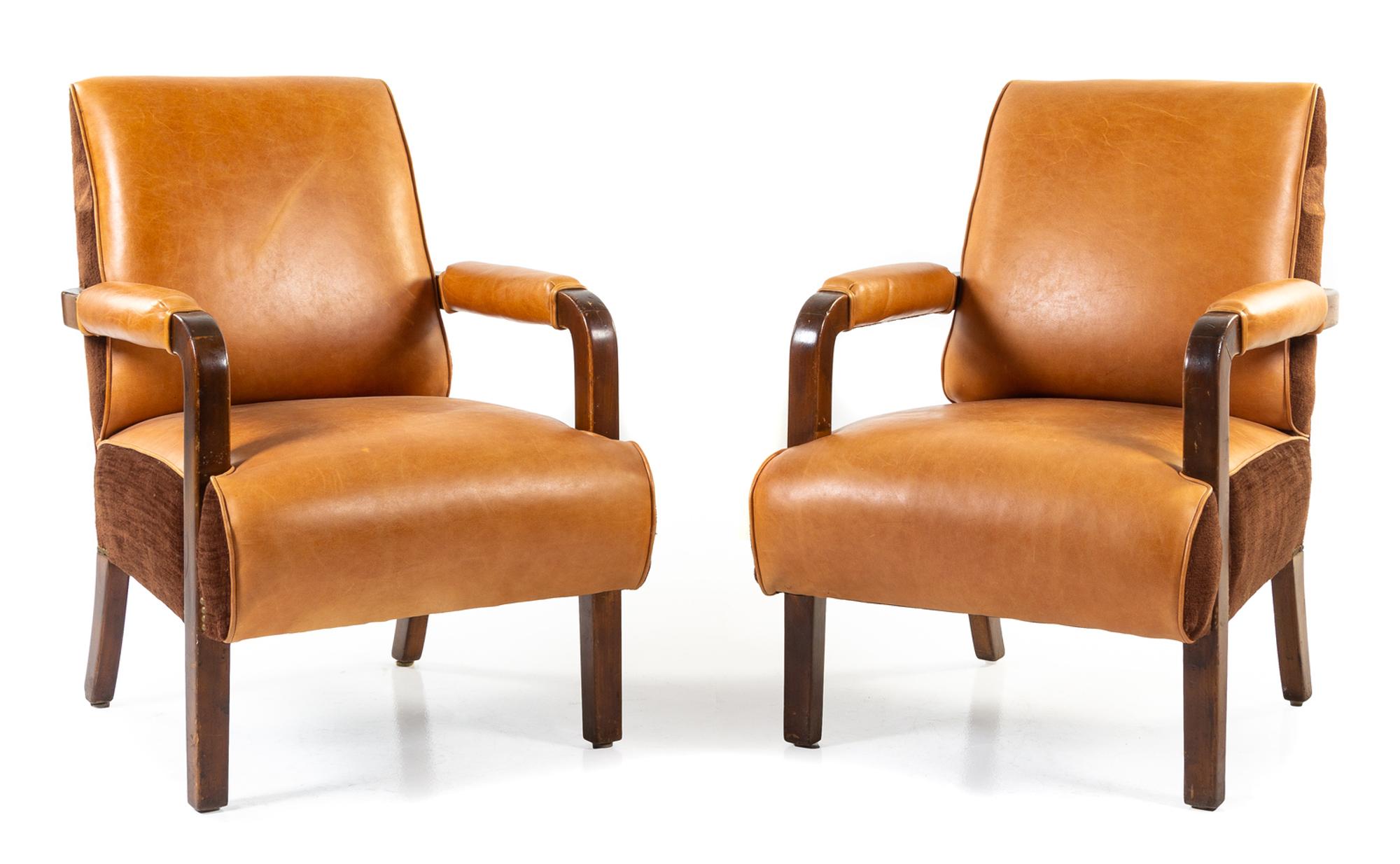 A Pair of Upholstered Pullman Car Armchairs