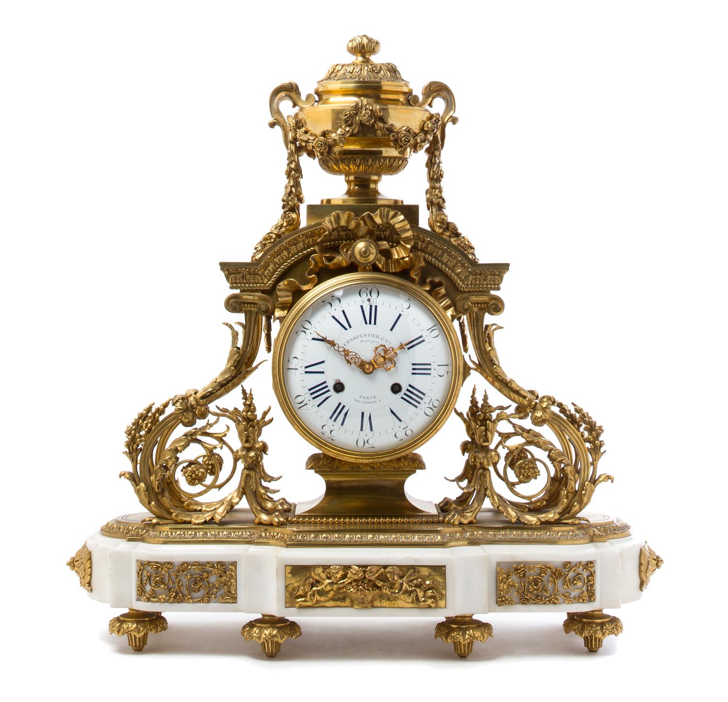 A French Gilt Bronze and Marble Mantel Clock Height 23 inches. — CHARPENTIER & CIE, PARIS