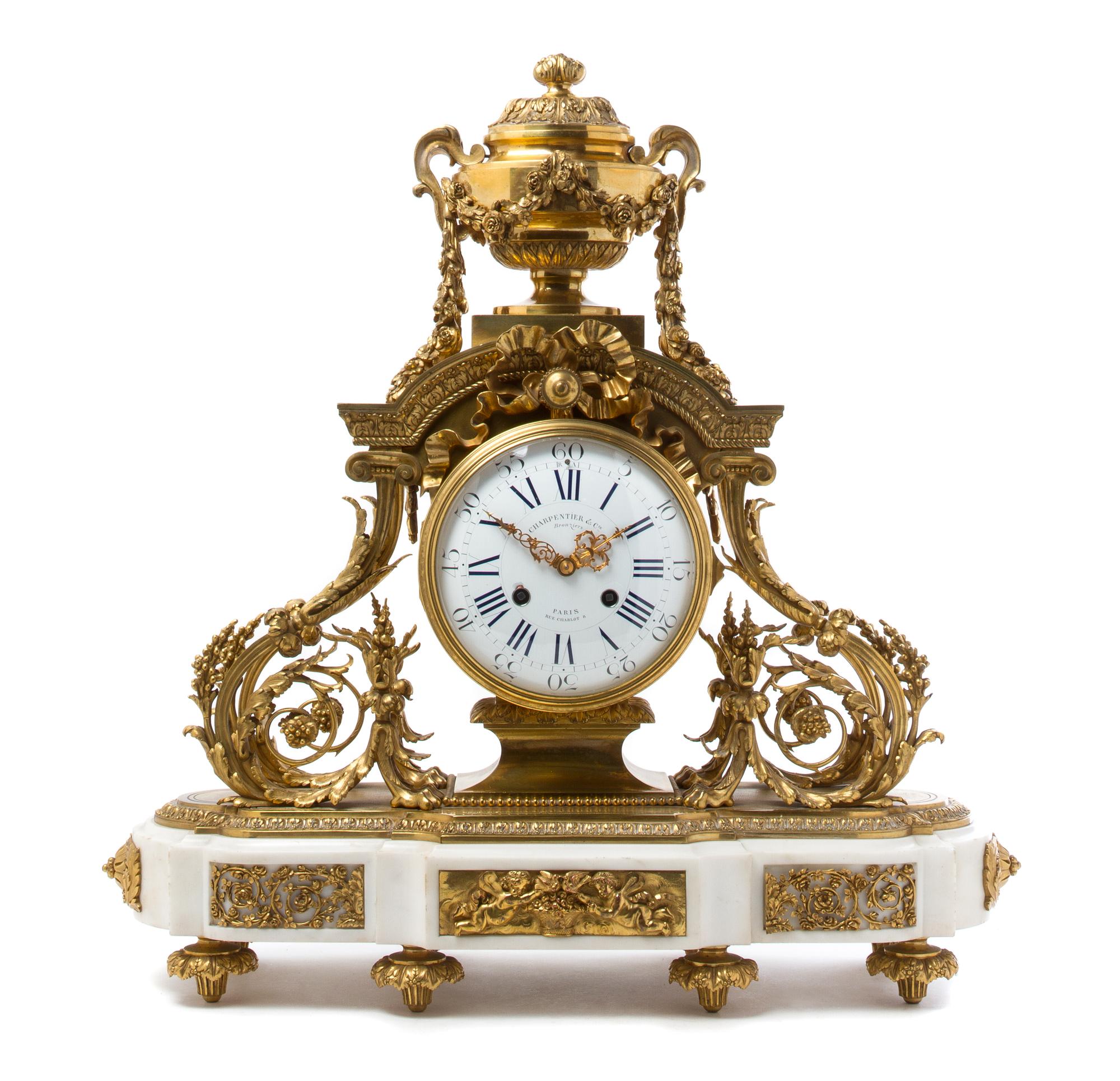 A French Gilt Bronze and Marble Mantel Clock Height 23 inches. — CHARPENTIER & CIE, PARIS