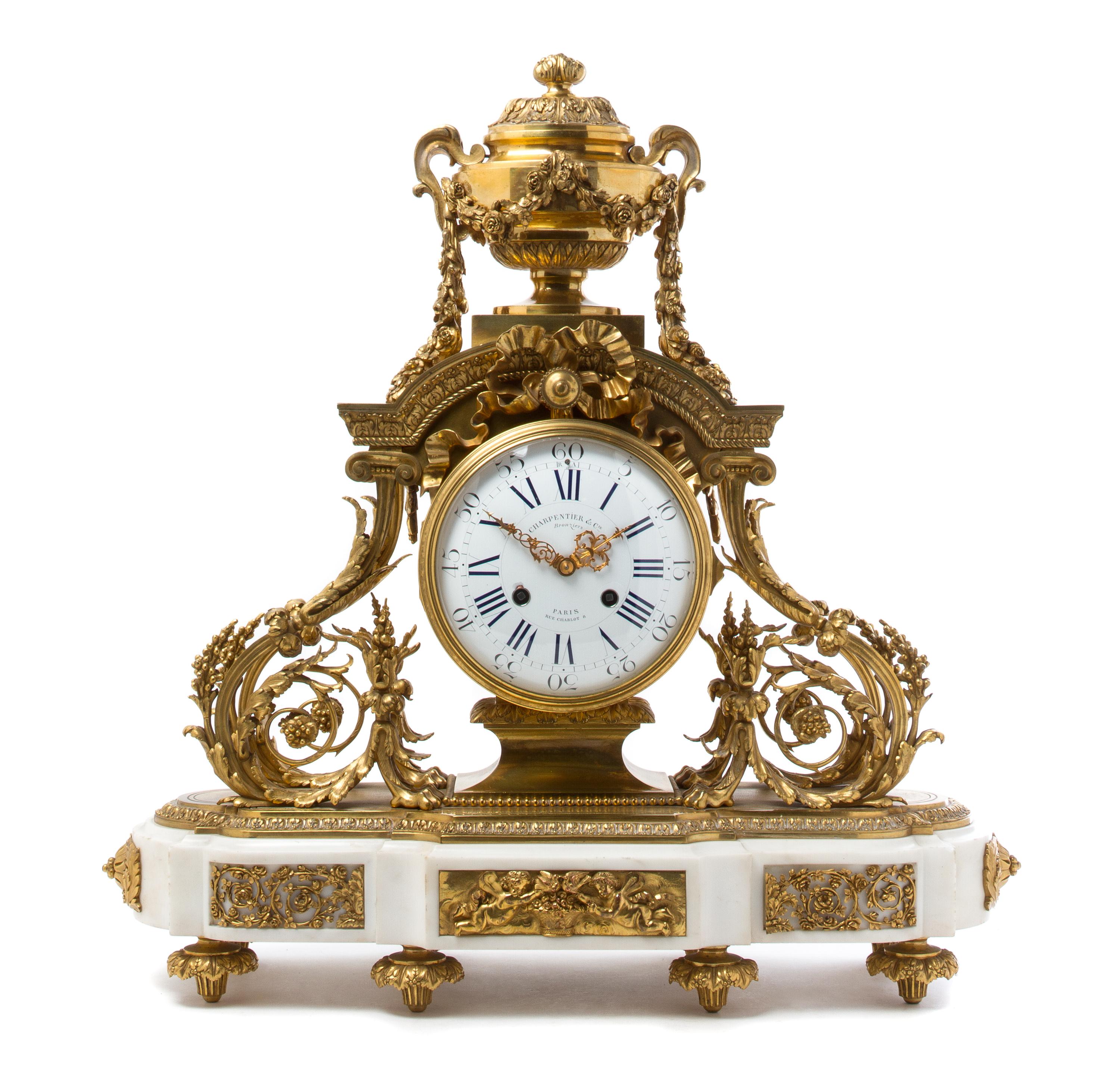 A French Gilt Bronze and Marble Mantel Clock Height 23 inches. — CHARPENTIER & CIE, PARIS
