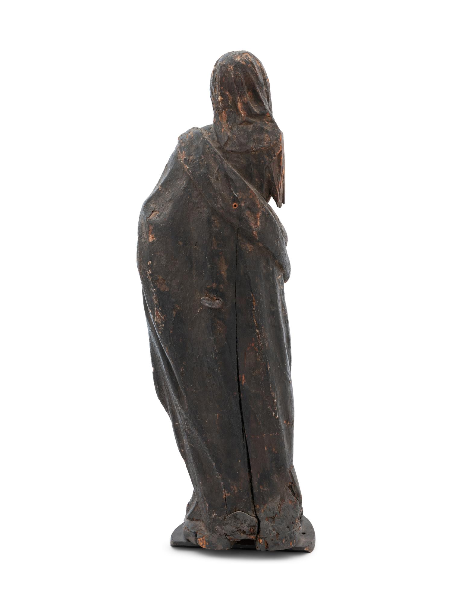 A Continental Carved Wood Figural Group Depicting the Madonna and Child