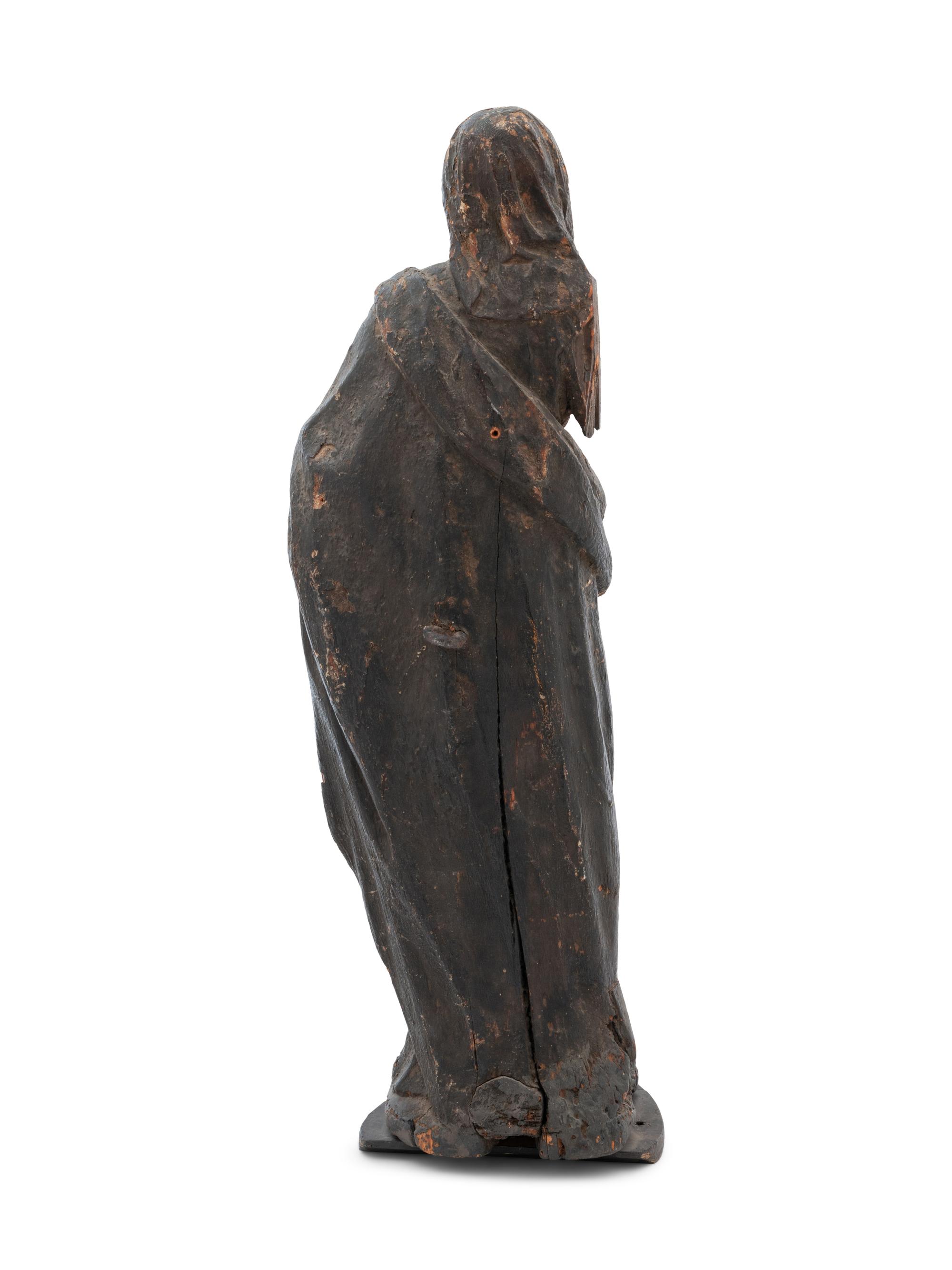 A Continental Carved Wood Figural Group Depicting the Madonna and Child