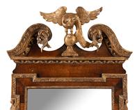 A George II Walnut and Parcel Gilt Mirror
