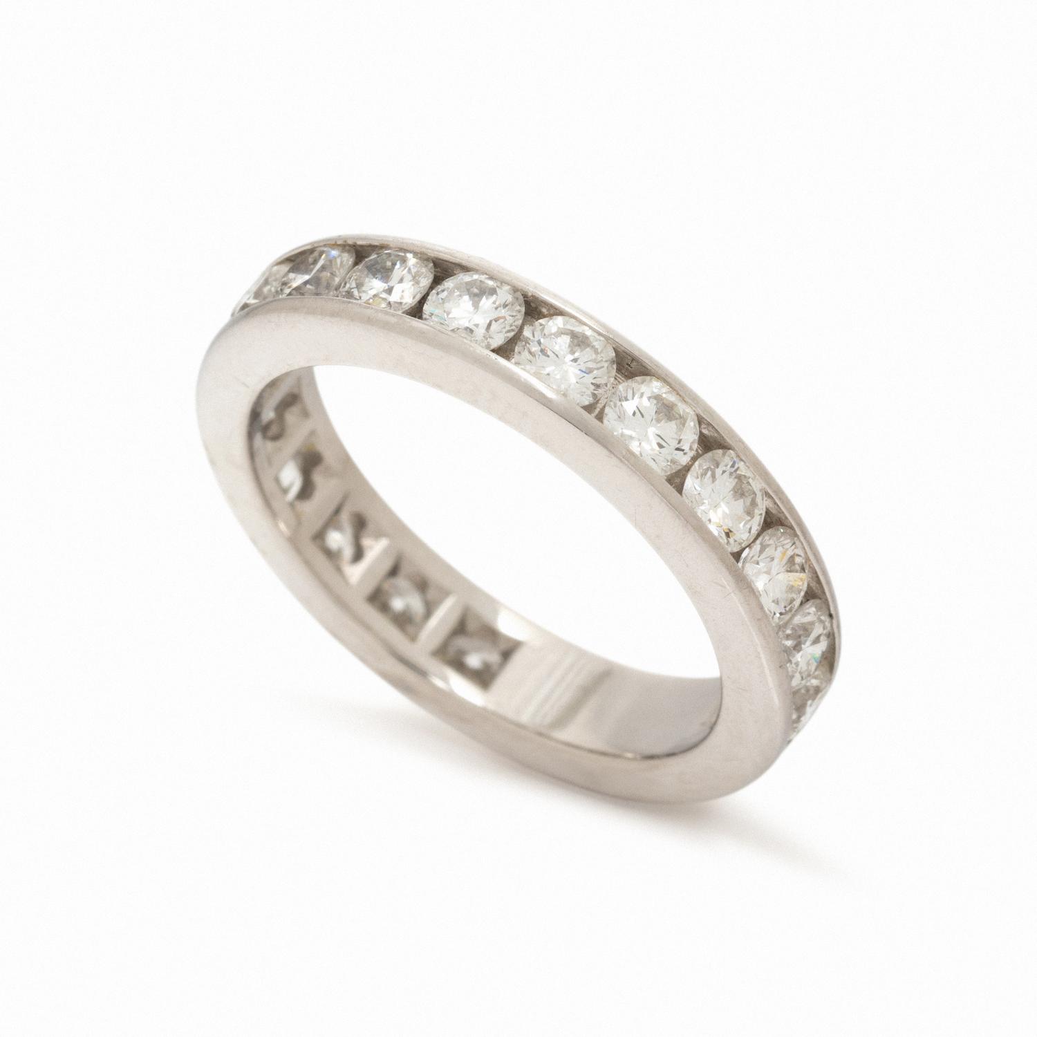 TIFFANY & CO., DIAMOND AND PLATINUM ETERNITY BAND RING