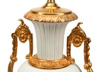 A Pair of Gilt Metal Mounted Bisque Porcelain Lamps