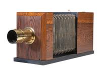 [CAMERAS]. Replica Lewis-style half plate daguerreotype camera with C.C. Harrison lens.