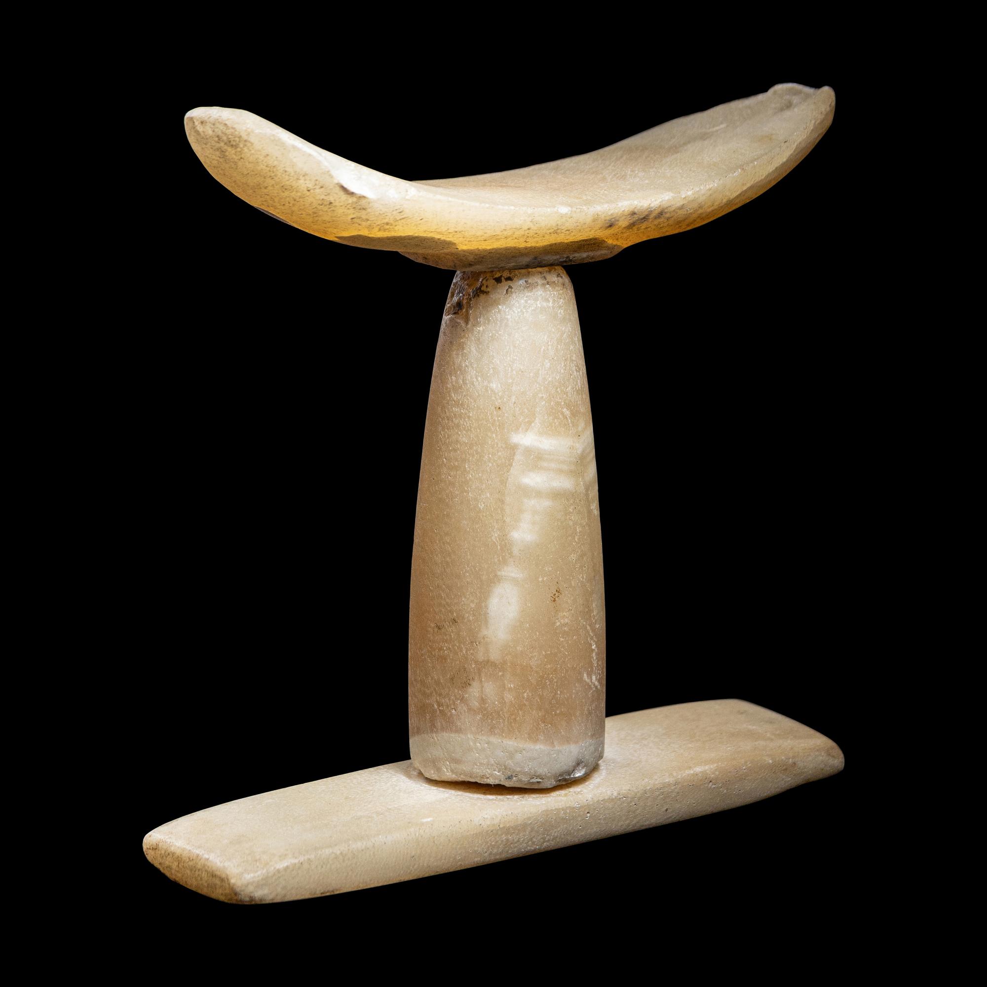 An Egyptian Alabaster Headrest