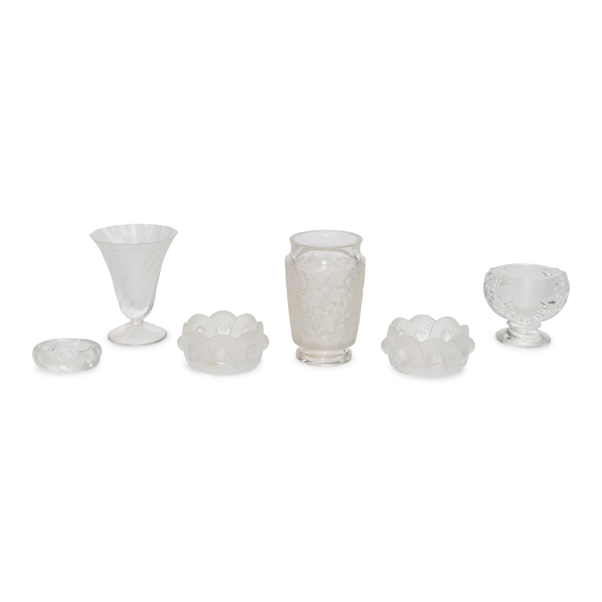 A Collection of Six Lalique Glass Table Articles
