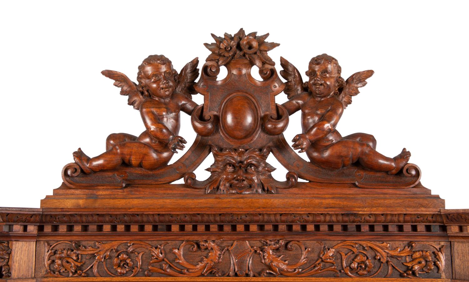 A Renaissance Revival Carved Walnut Cabinet In the Manner of Alexander Roux