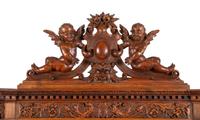 A Renaissance Revival Carved Walnut Cabinet In the Manner of Alexander Roux
