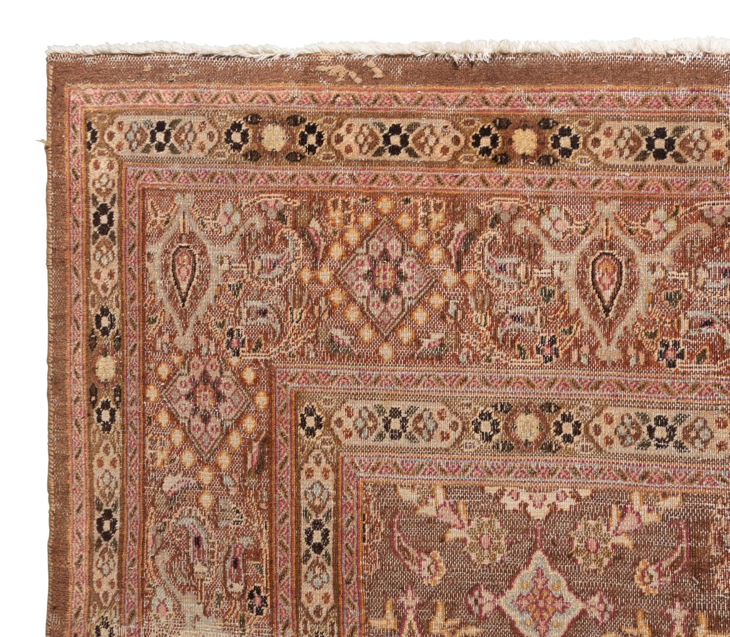 A Tabriz Wool Rug