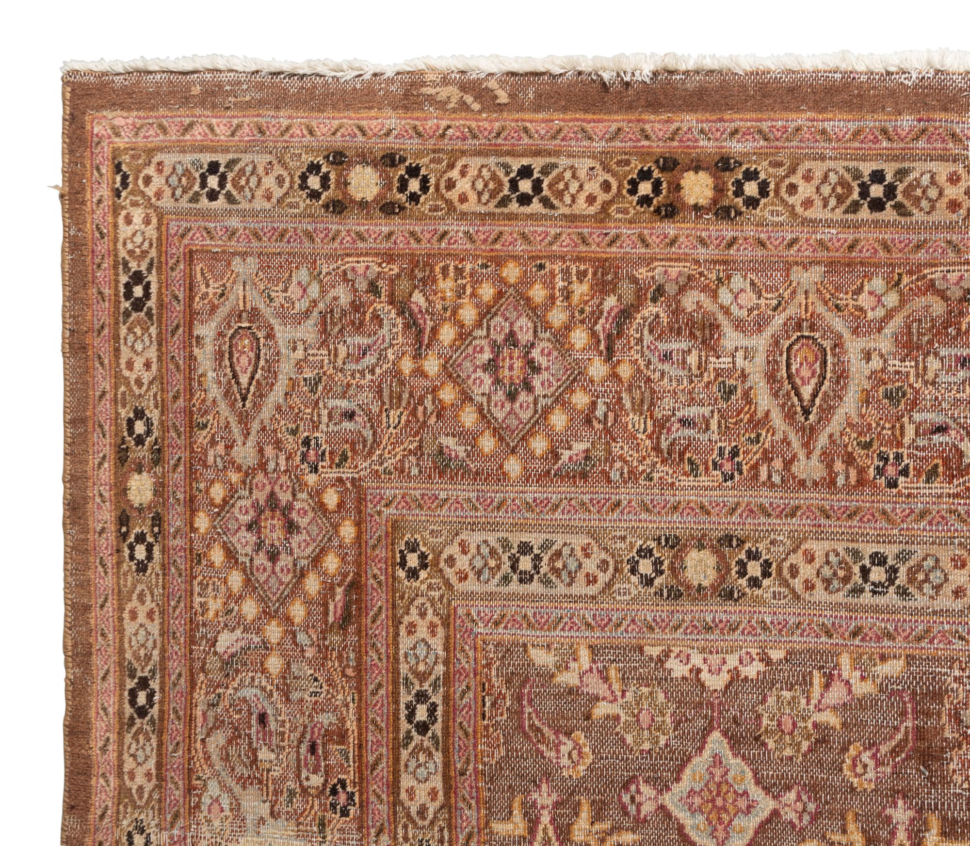 A Tabriz Wool Rug