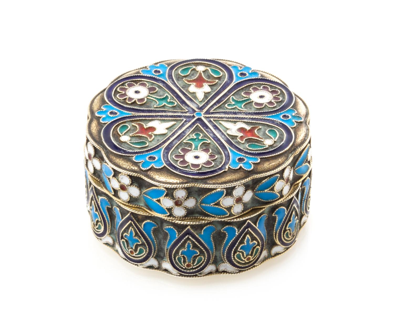 A Russian Silver and Enamel Pill Box, Maker's mark Cyrillic IS, city mark likely Odessa, of lobed, circular form and decorated with pol