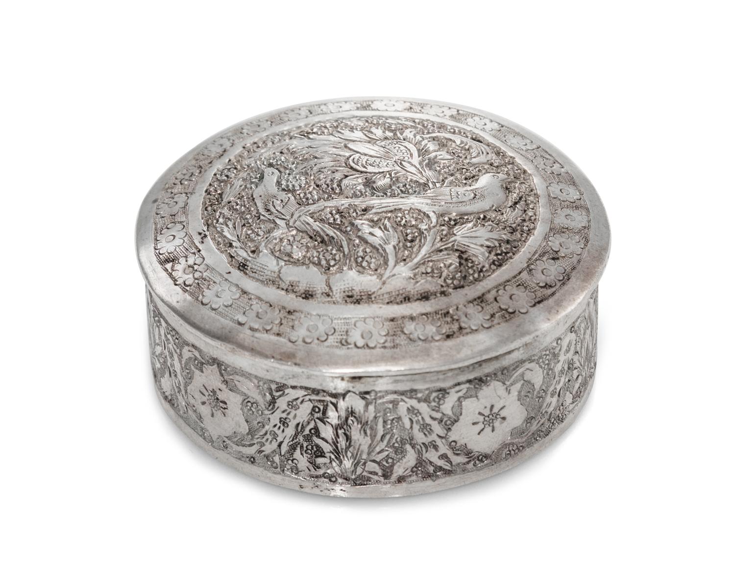 A Chinese Silver Box, , of circular form, the lid decorated with exotic bords and a repeating floral border.