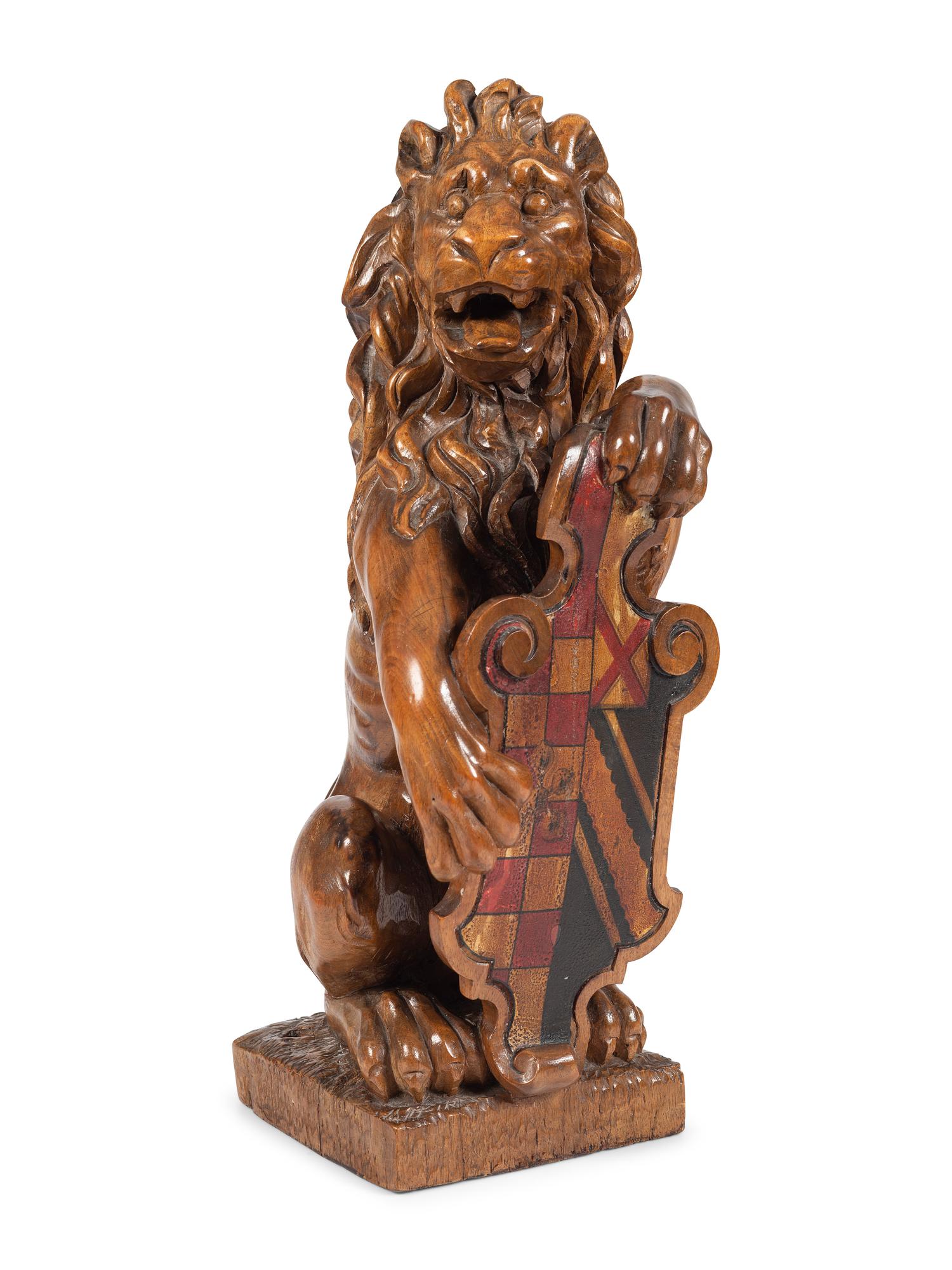A Carved Wood Lion Newel Post Figure