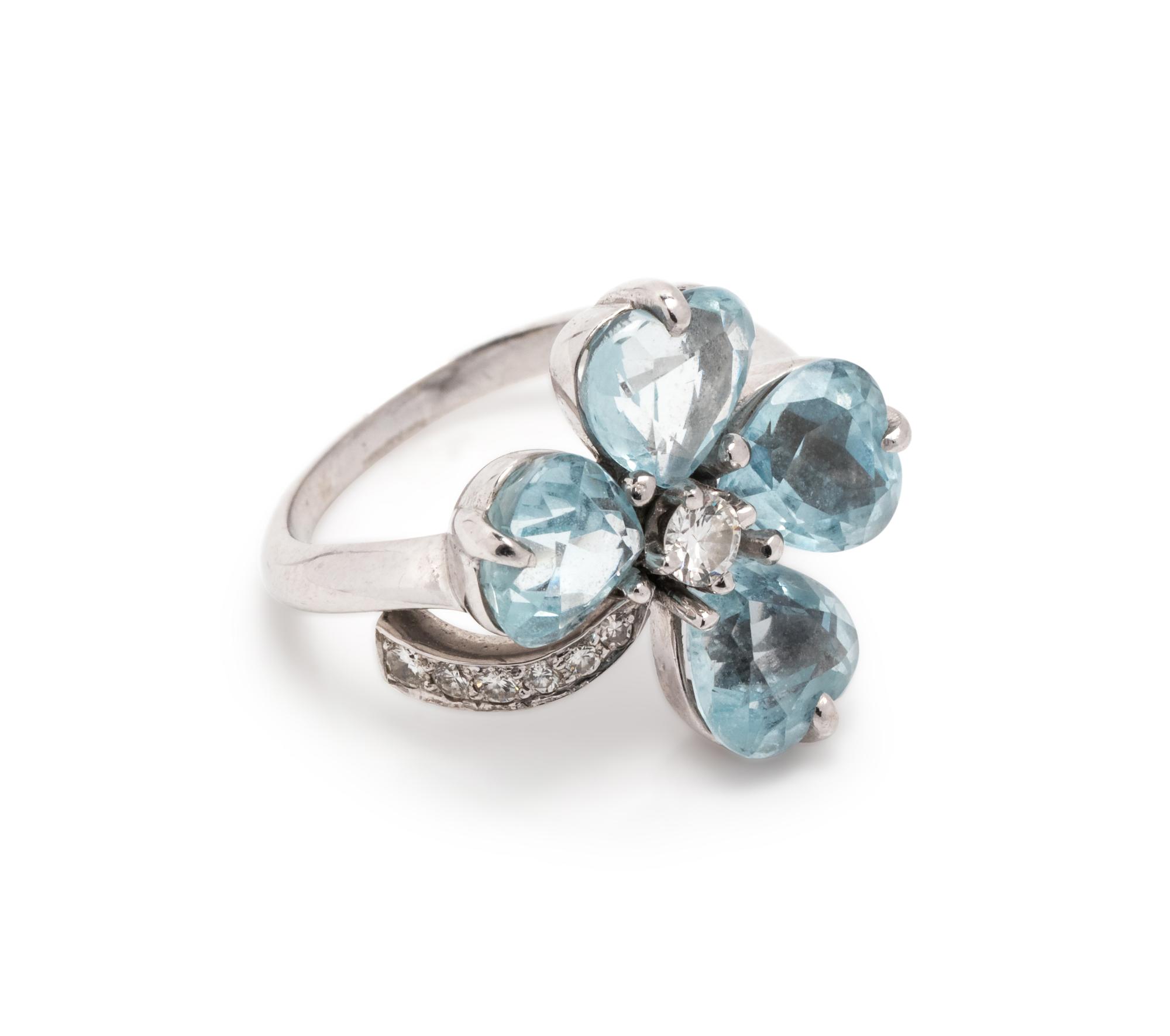 AQUAMARINE AND DIAMOND FLOWER RING