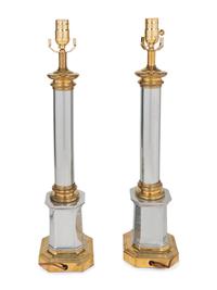 A Pair of Brass and Steel Columnar Lamps