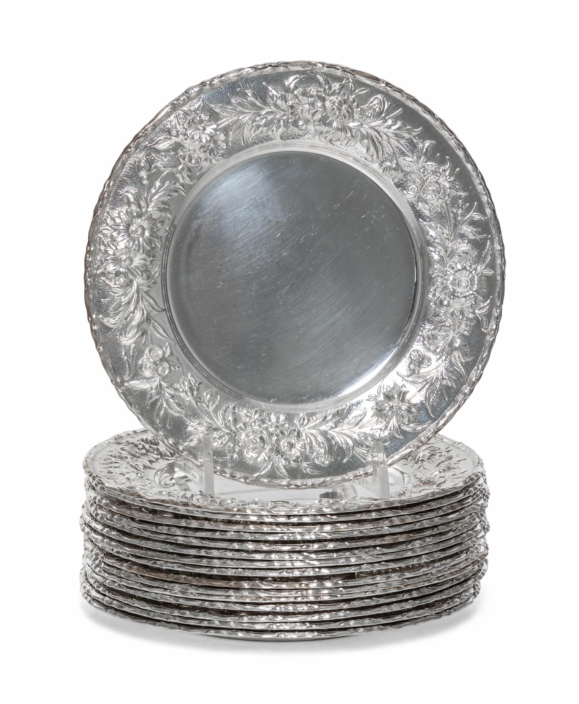 A Set of Sixteen American Silver Bread Plates, S. Kirk & Son, Baltimore, MD, Circa 1930, circular, the borders chased with dense flower
