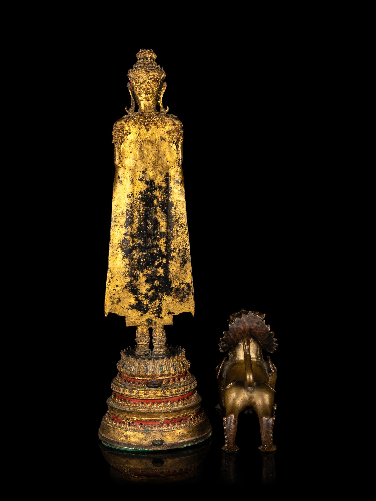 A Thai Gilt Bronze Figure of Standing Buddha and a Southeast Asian Bronze Figure of a Mythical Beast