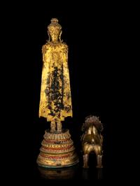 A Thai Gilt Bronze Figure of Standing Buddha and a Southeast Asian Bronze Figure of a Mythical Beast