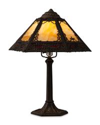 A Cast Iron and Slag Glass Table Lamp