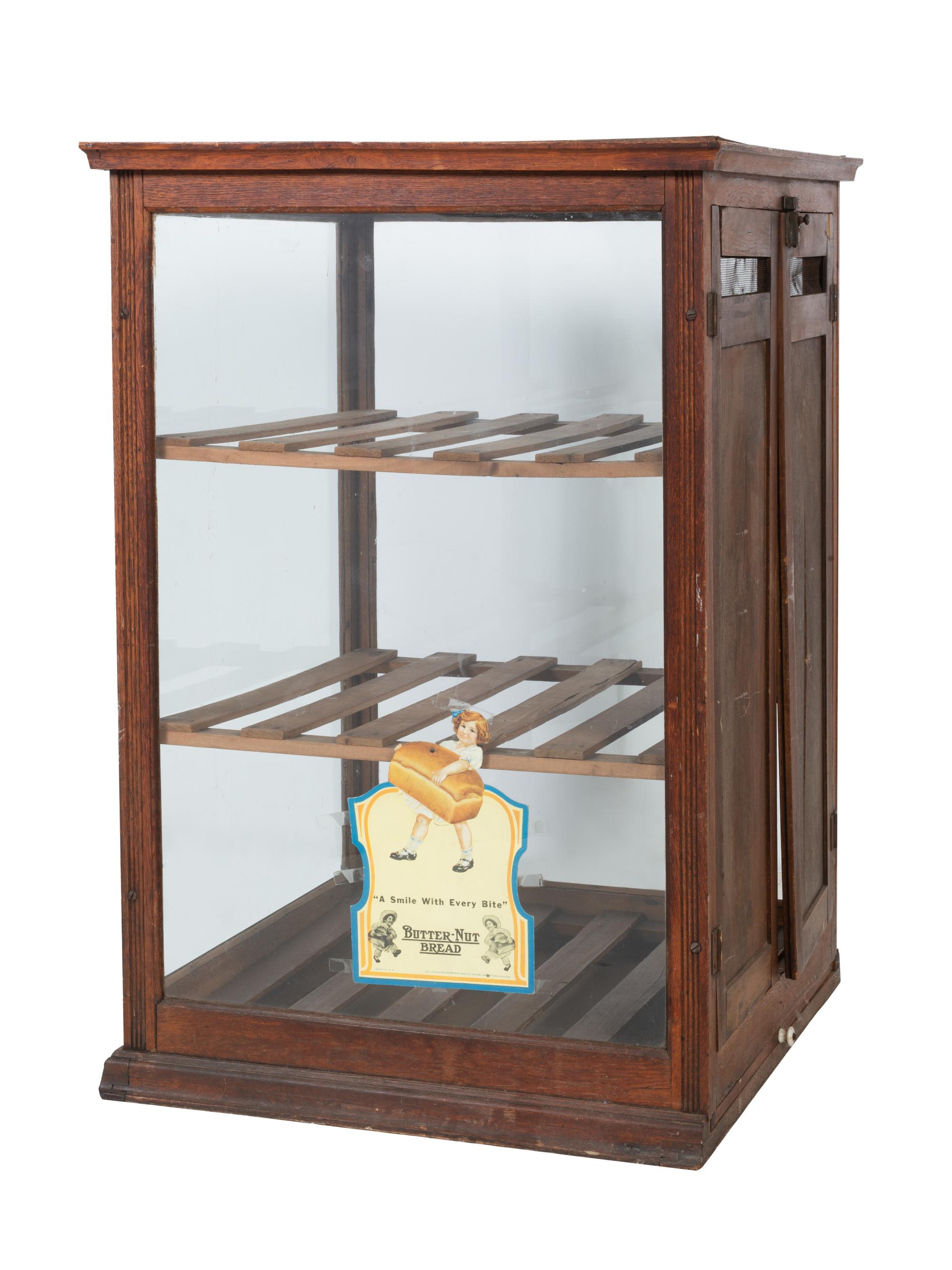 A Wooden Frame Butternut Bread Bakery Countertop Display Case
