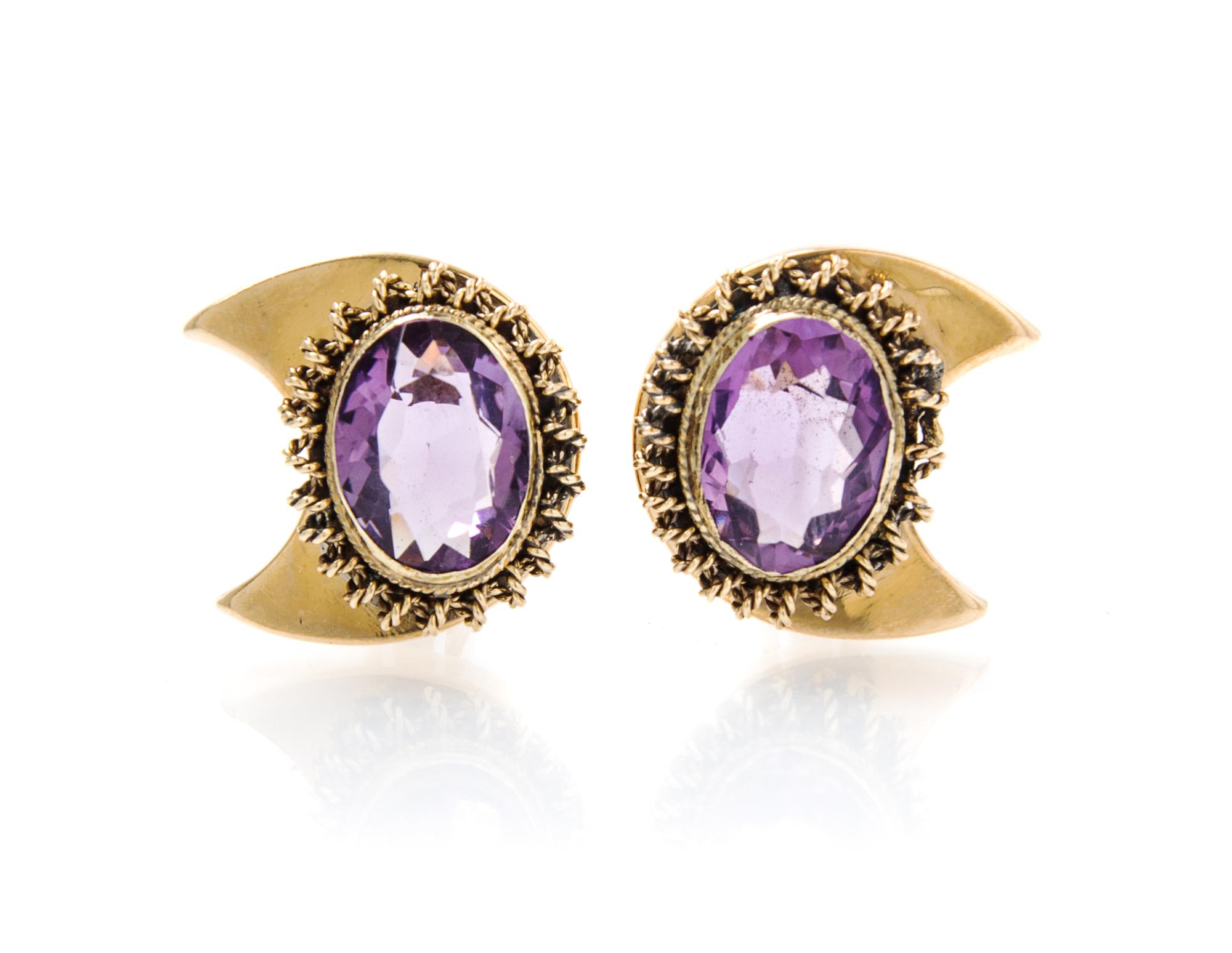 A Pair of 14 Karat Yellow Gold and Amethyst Earclips, 9.40 dwts.