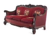 A Rococo Revival Carved Walnut Three-Piece Seating Suite in the Style of Karpen