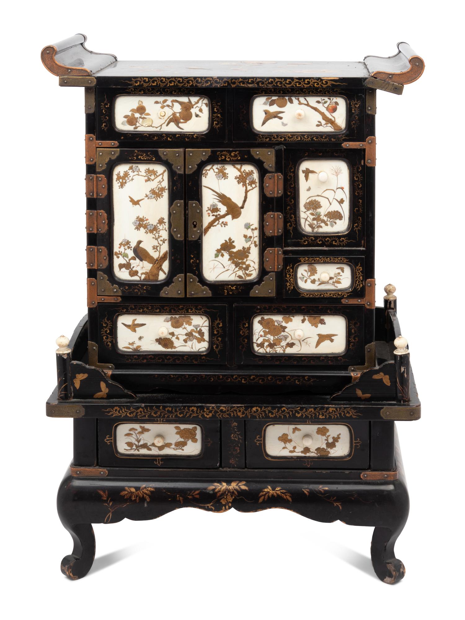 A Japanese Parcel Gilt Lacquered Table Cabinet