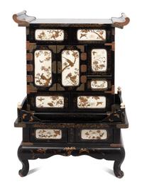 A Japanese Parcel Gilt Lacquered Table Cabinet