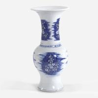 A Chinese blue and white carved "prunus" phoenix-tail vase 青花瓷雕梅花凤尾尊
