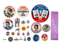 [KENNEDY, John F. (1917-1963)]. A group of 25 political buttons, token, and ribbon for John F. Kennedy, Bobby Kennedy, Teddy Kennedy, and Lyndon Johnson.