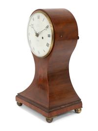 A Victorian Mahogany Balloon Clock