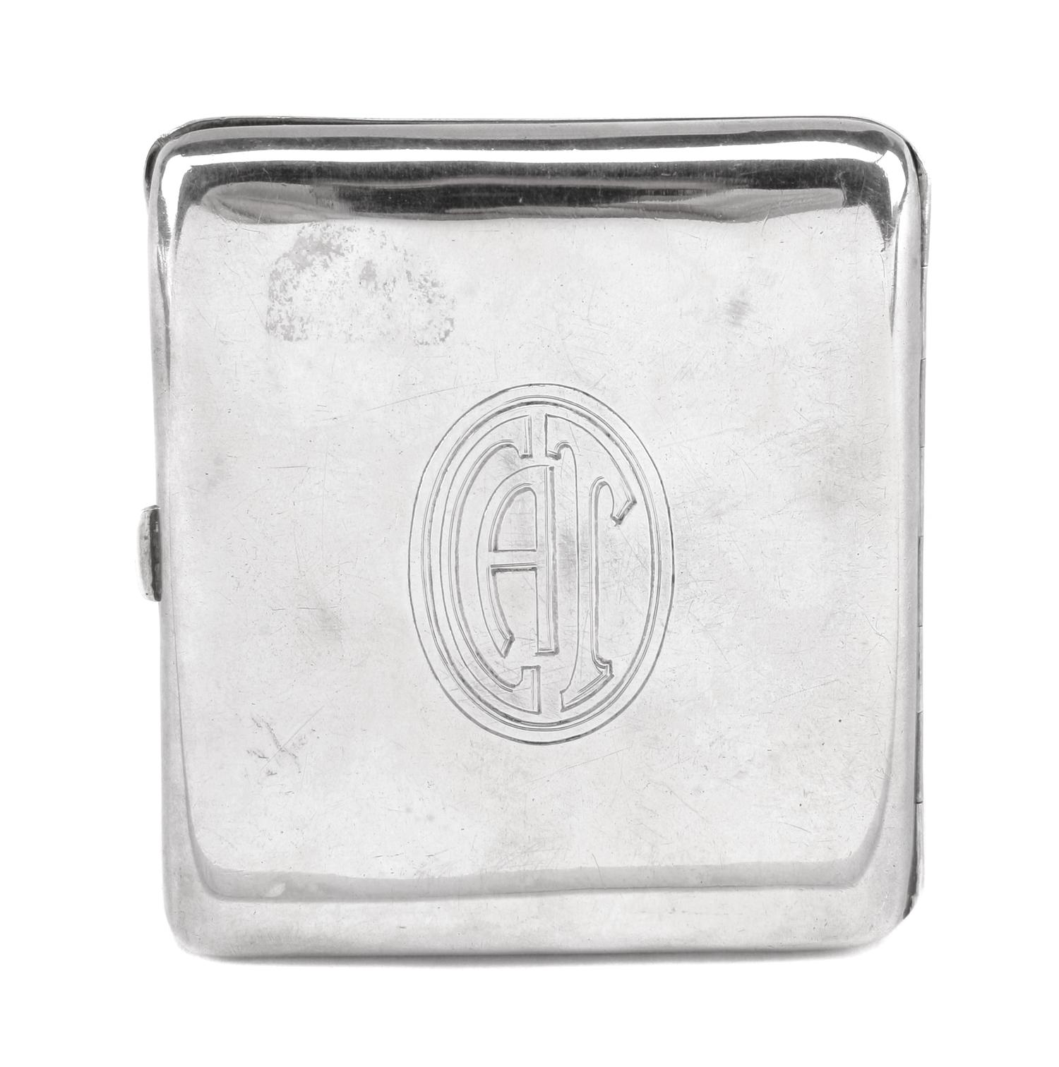 A German Enameled Silver Cigarette Case, Late 19th/Early 20th Century, the guilloche enamel decorated lid centered by a roundel depicti