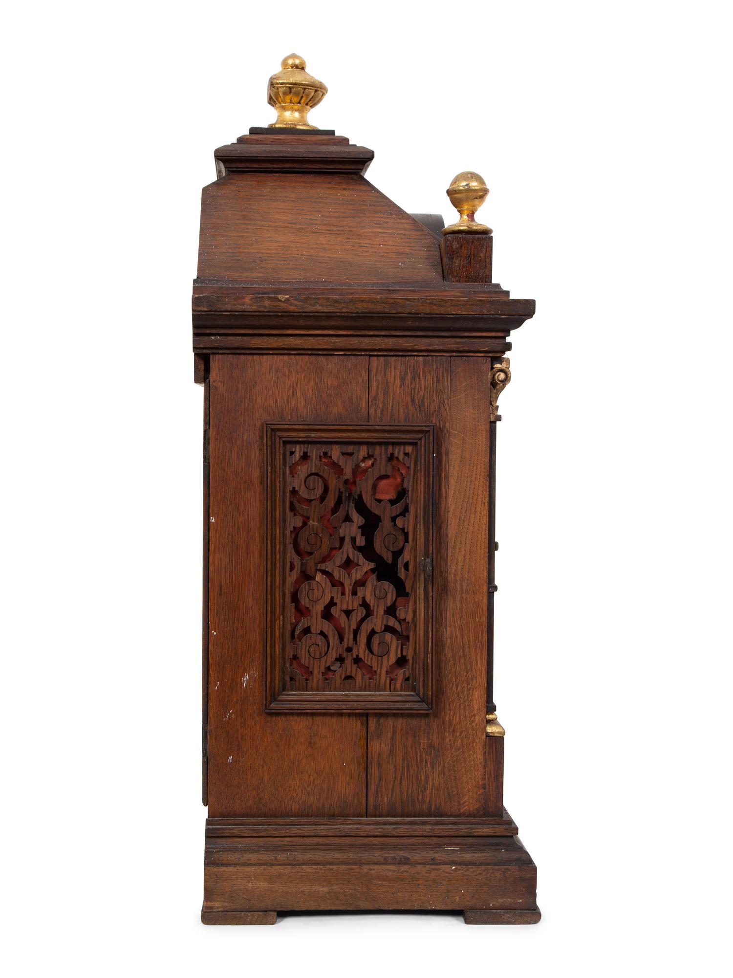 A Victorian Gilt Metal Mounted Oak Bracket Clock