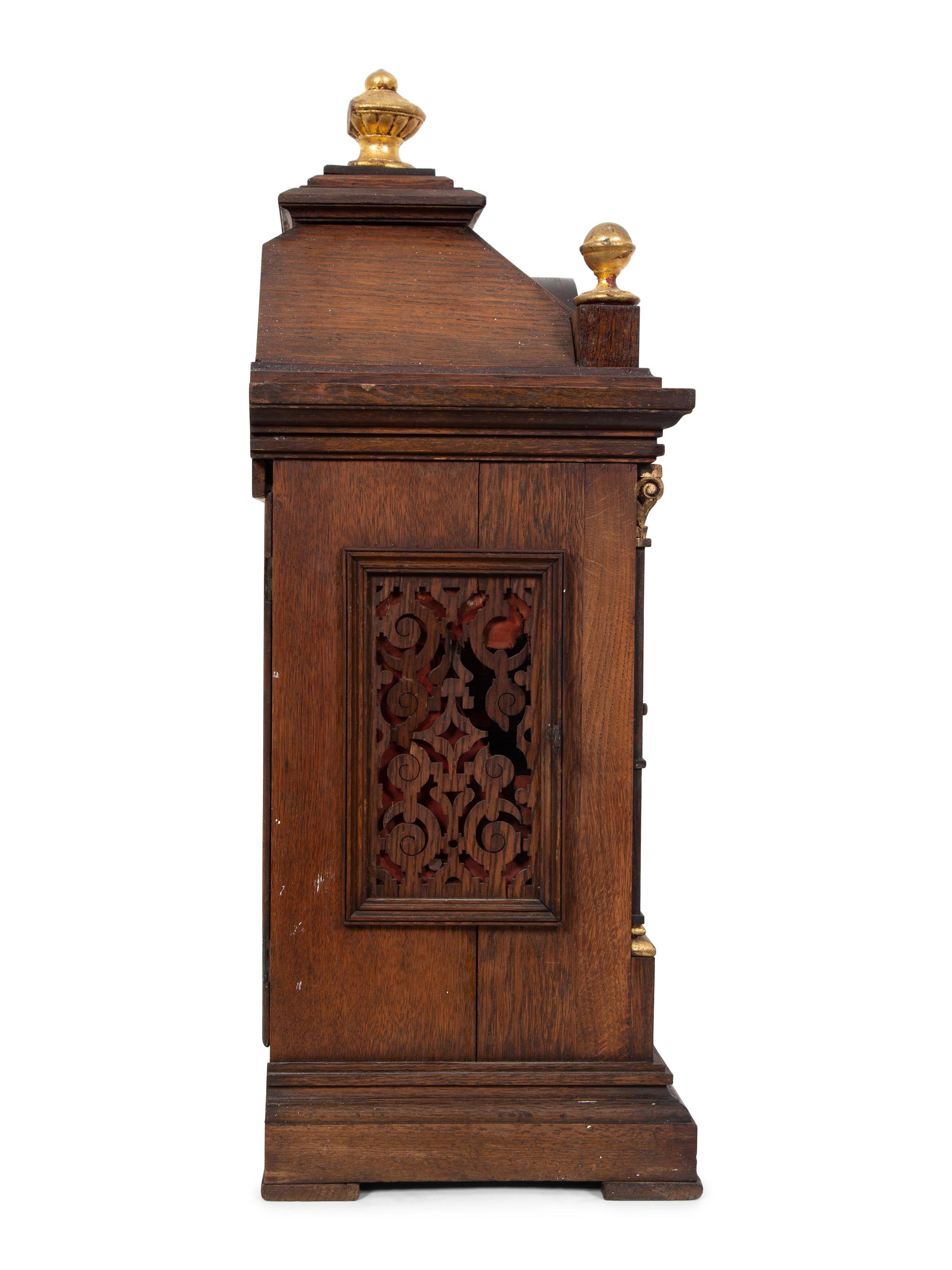 A Victorian Gilt Metal Mounted Oak Bracket Clock