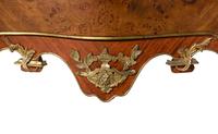 A Louis XV Style Gilt Bronze Mounted Marble-Top Bombe Commode