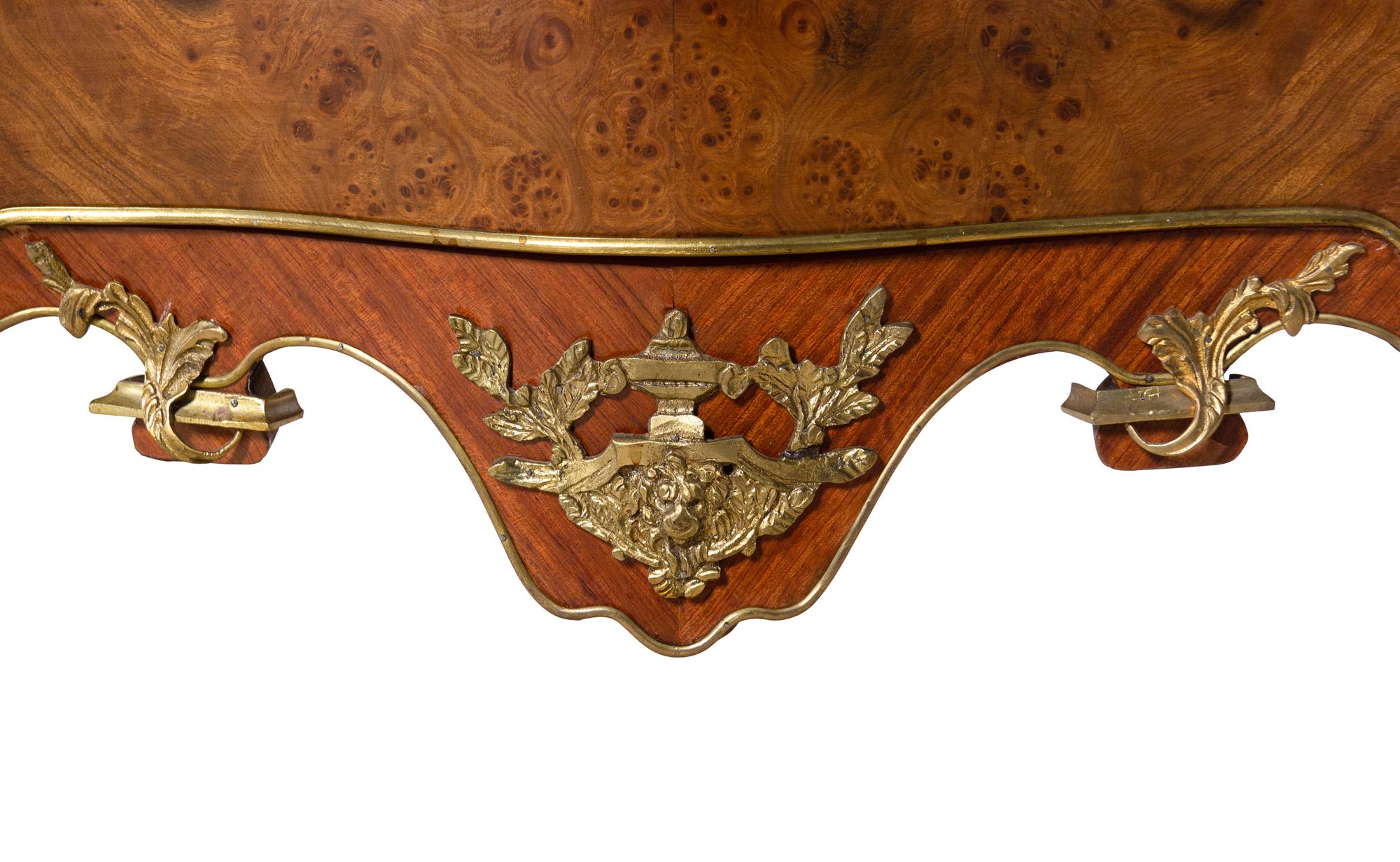 A Louis XV Style Gilt Bronze Mounted Marble-Top Bombe Commode