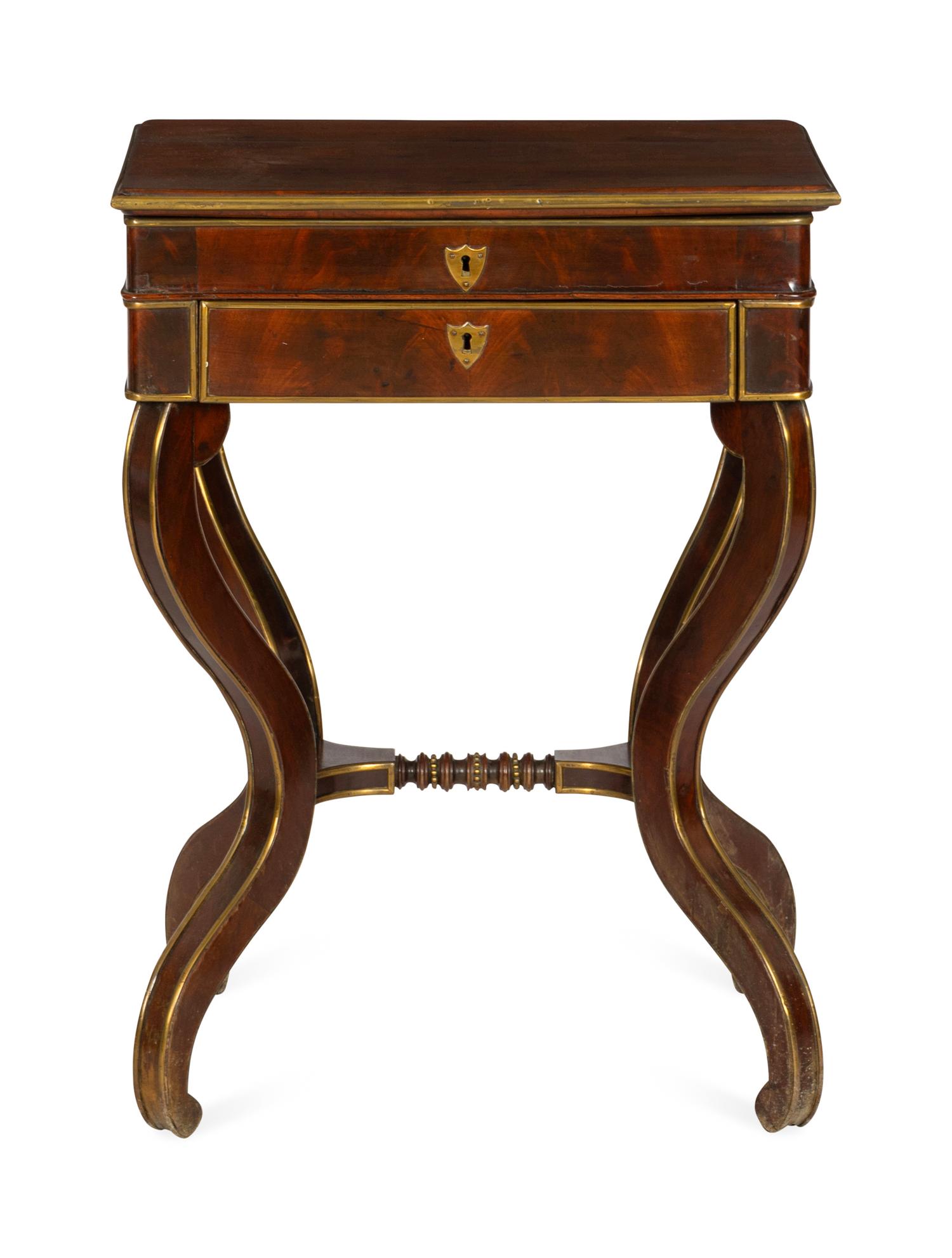 An Italian Mahogany Veneered and Brass Mounted Work Table